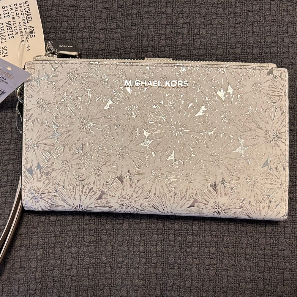 Michael kor floral chrome wristlet